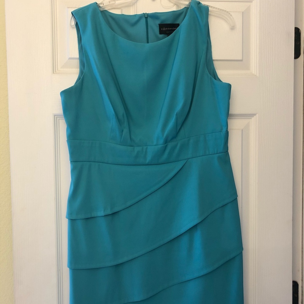 Cute gently used teal dress.